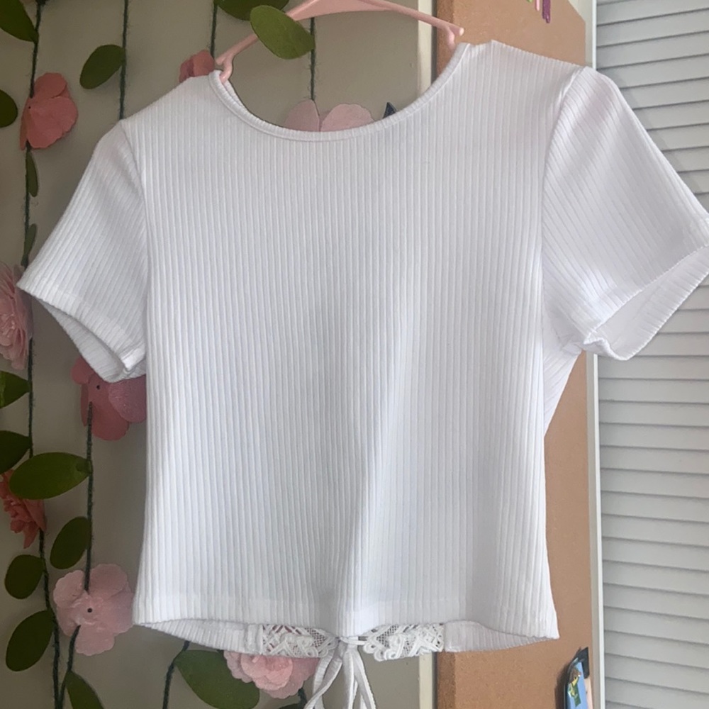white blouse with design on the back